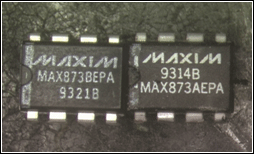 Figure 1. Valid Maxim part with correct grade B on the left and counterfeit part with grade A on the right. Note the evidence of the counterfeit rework on the vertical white line at the left side of the chip. There is a significant, diminished contrast between that white line and the new ink for the logo, date code, and part number. Note also the incorrect placement of the logo and date code.
